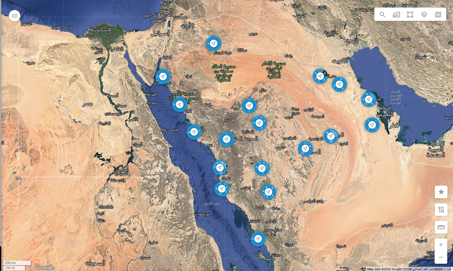 The Navixy fleet management interface showing a live map with tracked vehicles
